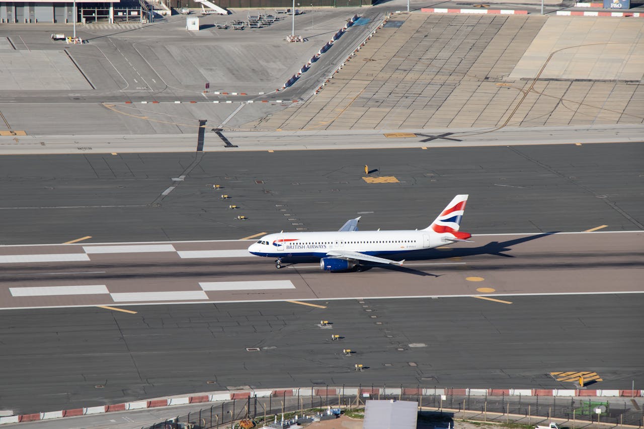 The Art of Drawing Readers In: Your attractive post title goes here A British Airways aircraft on the runway, preparing for takeoff at Gibraltar Airport.